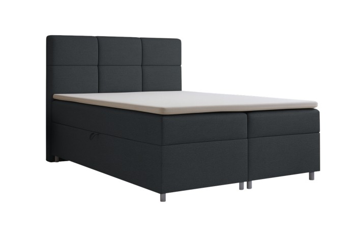 Elegant boxspringbed in antraciet met een groot gestoffeerd hoofdbord op een witte achtergrond.