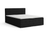Schwarzes Boxspringbett aus Cord mit weißer Matratzenauflage vor weißem Hintergrund