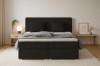 Elegant black Bello box-spring bed with high headboard in front view.