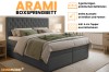 Boxspringbett Arami mit Bettkasten und Kopfteil in einer gemütlichen Schlafzimmerumgebung.
