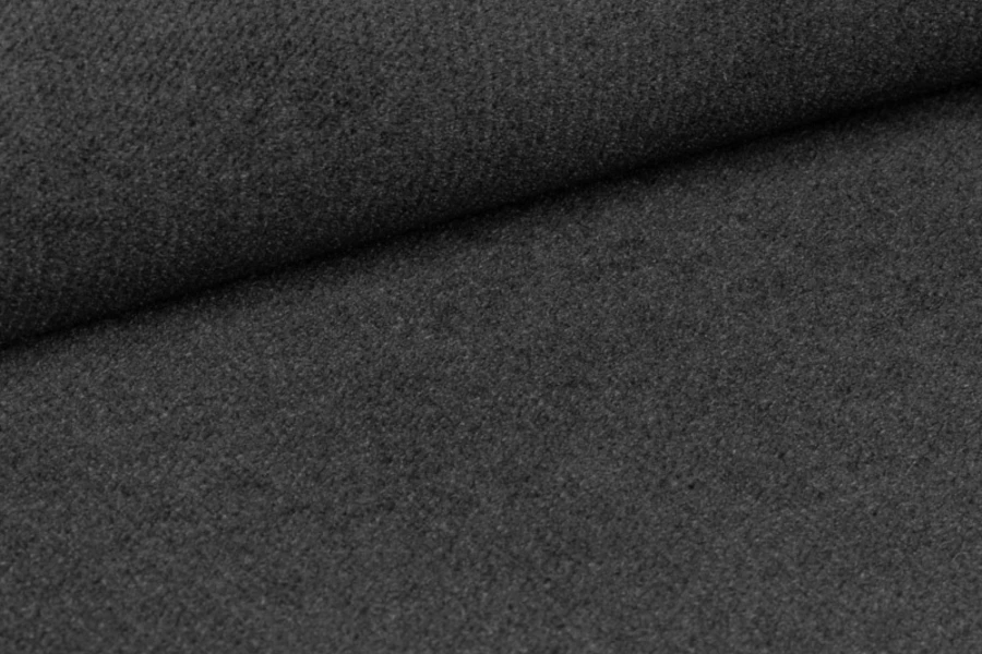 Detailansicht eines dunkelgrauen Stoffbezugs für Polsterbetten und Boxspringbetten.