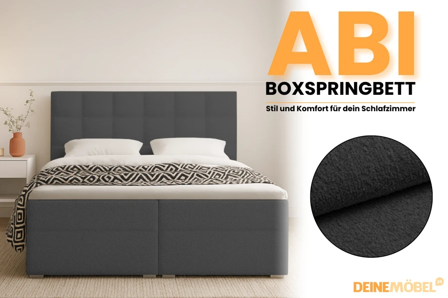 Box spring bed Abi in dark grey focusing on the soft fabric structure of the cover.