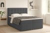 Anthrazitfarbenes Boxspringbett mit Rautensteppung am Kopfteil in modernem Schlafzimmer-Design.