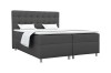 Dunkelgraues Boxspringbett mit gestepptem Kopfteil und Metallfüßen auf weißem Grund.