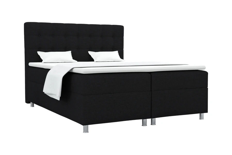 Elegantes Boxspringbett in Schwarz mit gepolstertem Kopfteil und weißer Bettwäsche.
