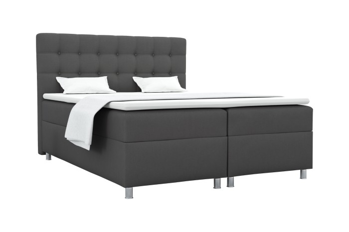 Dunkelgraues Boxspringbett mit gestepptem Kopfteil und modernen silbernen Standfüßen.