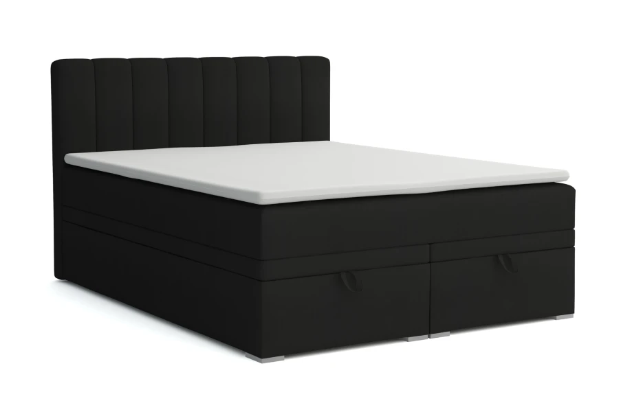 Zwart boxspringbed David met bedbak en witte topper voor een witte achtergrond.