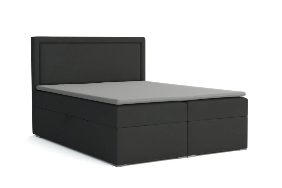 Anthrazitfarbenes Boxspringbett mit Bettkasten und grauem Topper auf weißem Hintergrund.