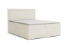 Modernes Boxspringbett in Creme mit gepolstertem Kopfteil vor weißem Hintergrund.