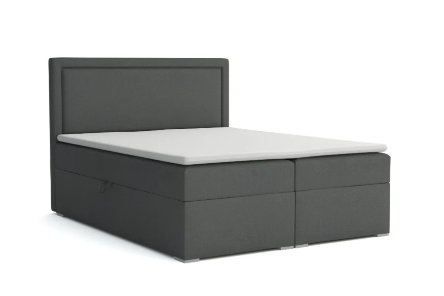 Modernes Boxspringbett in Anthrazit mit weißem Topper und gepolstertem Kopfteil.