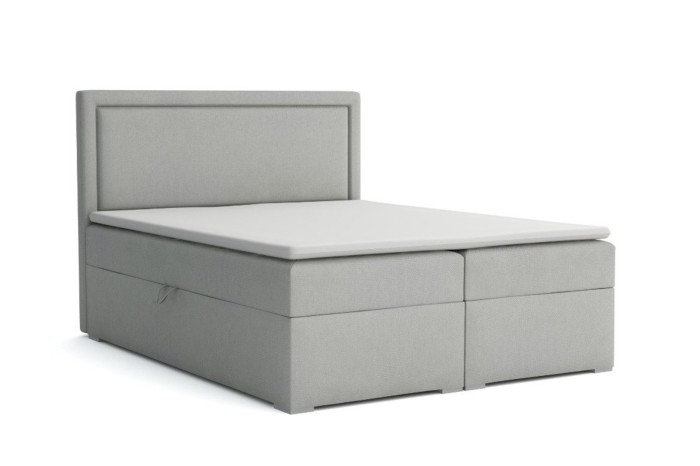 Freigestellte Ansicht des grauen Boxspringbetts Dream mit praktischer Stauraumfunktion.