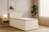 Helles Boxspringbett Jung I in einem modern eingerichteten Schlafzimmer