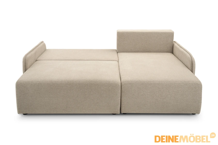 Beiges Schlafsofa im ausgeklappten Zustand als Gästebett.