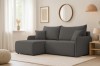 Modernes dunkelgraues Ecksofa in hell eingerichtetem Wohnzimmer mit Parkettboden.