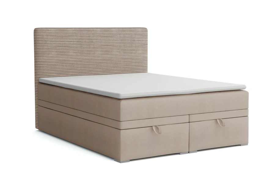 Beige Boxspringbett mit Bettkasten und geripptem Kopfteil, isoliert auf weiß.
