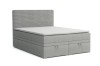 Graues Boxspringbett mit zwei Schubladen und Cord-Kopfteil auf weißem Hintergrund.
