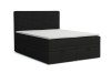 Dunkelgraues Boxspringbett mit zwei Schubladen und hohem Kopfteil in gerippter Optik.