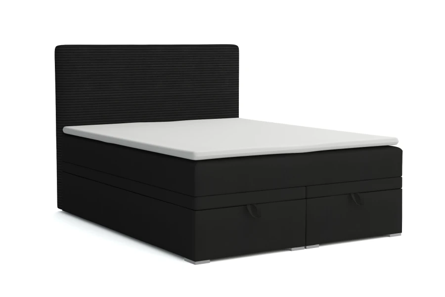 Dunkelgraues Boxspringbett mit zwei Schubladen und hohem Kopfteil in gerippter Optik.