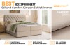 Beige boxspringbed in de slaapkamer met gecapitonneerd hoofdbord en opbergruimte – DeineMöbel24
