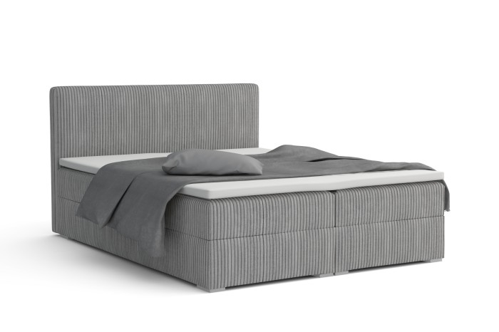 Modern boxspringbed van grijs corduroy met opbergruimte op een witte achtergrond.