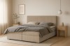 Einladendes Schlafzimmer-Design mit stilvollem Boxspringbett in Cordoptik.