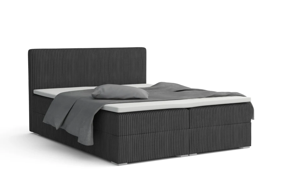 Modernes Boxspringbett in Anthrazit mit strukturiertem Cord-Bezug.