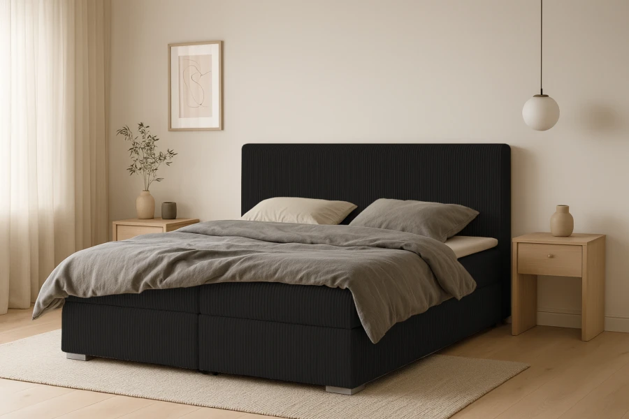 Elegantes dunkles Boxspringbett mit Cord-Optik im Schlafzimmer-Ambiente.