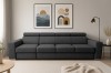 Stilvolles anthrazitfarbenes Sofa in einem hellen Wohnzimmer mit moderner Dekoration.