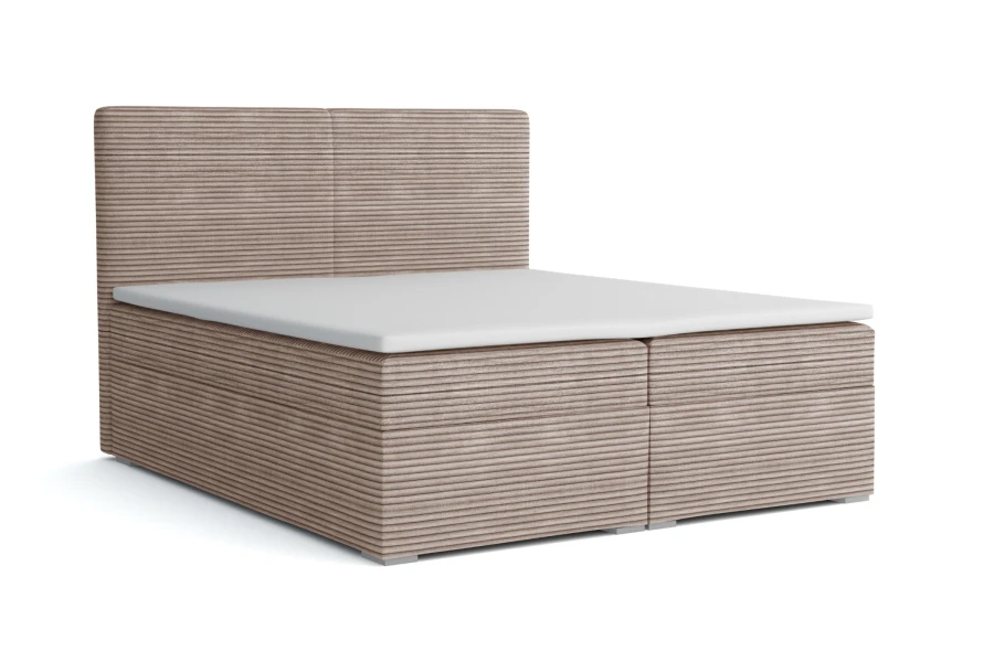 Beiges Boxspringbett mit Cord-Bezug und hohem Kopfteil.