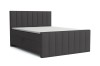 Dunkelgraues Boxspringbett mit elegantem, vertikal gestepptem Design.