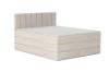 Boxspringbett Mexico in Beige mit elegantem, vertikal gestepptem Kopfteil.