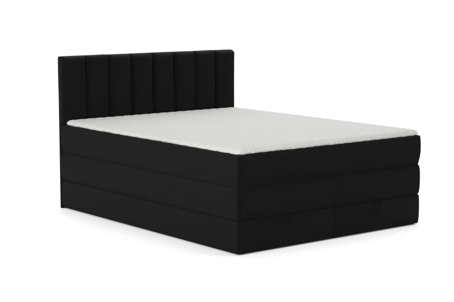Schwarzes Boxspringbett mit gepolstertem Kopfteil und weißer Matratze vor weißem Hintergrund.