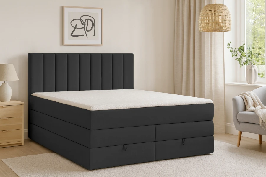 Modernes Boxspringbett in Anthrazit mit Bettkasten und hohem Kopfteil im Schlafzimmer