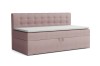 Roze gestoffeerde bedbank met opbergruimte en klassiek knoopontwerp op het hoofdbord.