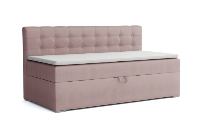 Pink upholstered bed bench with storage and classic button design on the headboard.