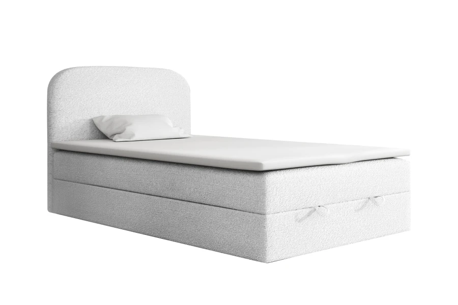 Weißes Boxspringbett mit Bouclé-Stoff und integriertem Bettkasten auf weißem Hintergrund.