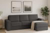 Anthrazitfarbenes Cord-Ecksofa in modern eingerichtetem Wohnzimmer mit Dekoration.