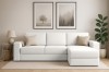 Gemütliches weißes Ecksofa in hellem Wohnzimmer mit moderner Wanddeko.