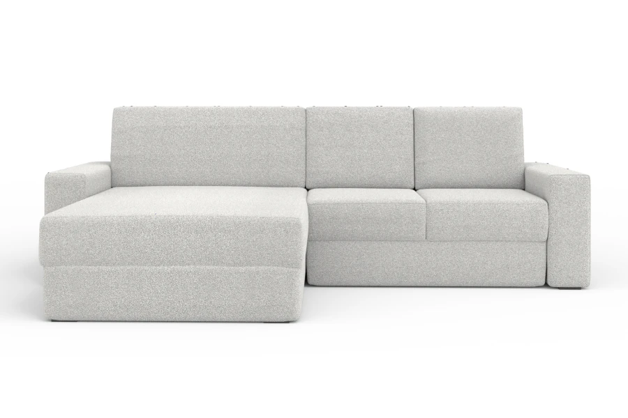 Hellgraues Ecksofa TOCO XL vor weißem Hintergrund mit Ottomane auf der linken Seite.