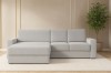 Hellgraues Ecksofa aus Bouclé-Stoff in modernem Wohnzimmer.