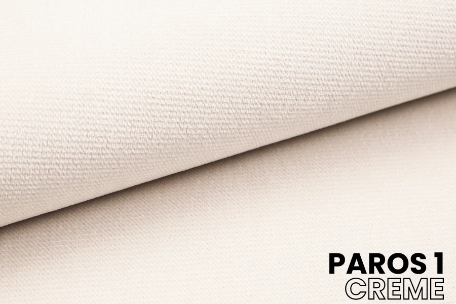 Stoffprobe Paros 1 Creme: Nahaufnahme des hochwertigen Velours-Bezugsstoffs für Möbel.