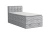 Graues Boxspringbett mit Cord-Bezug freigestellt auf weißem Hintergrund.