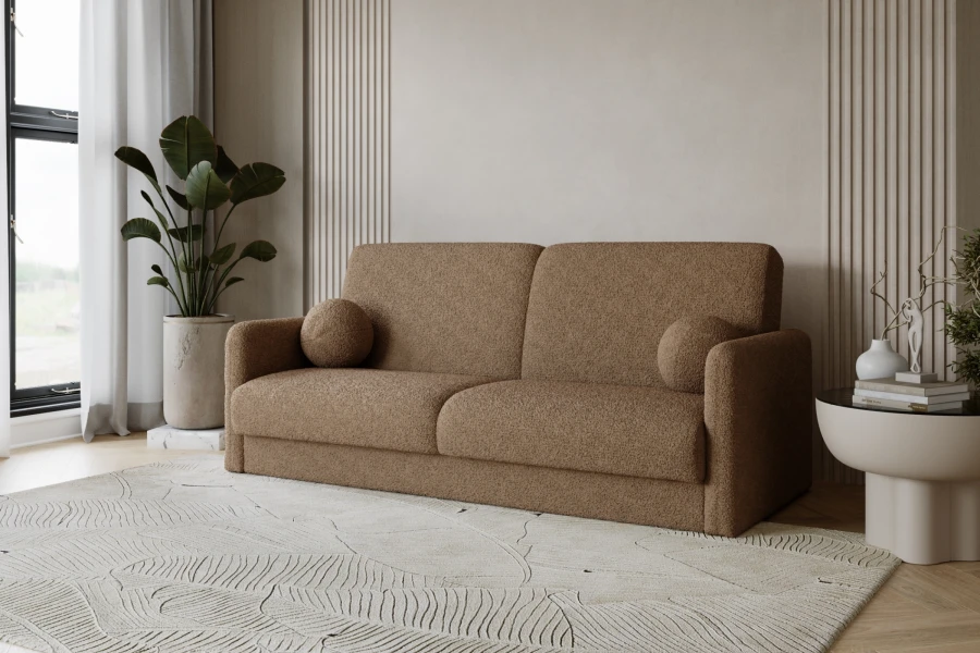 Taupefarbenes Bouclé-Schlafsofa in stilvoller Wohnumgebung mit Beistelltisch.