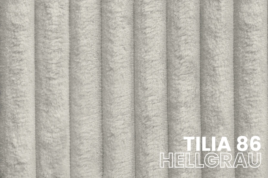 Nahaufnahme des Polsterstoffes Tilia 86 Hellgrau mit Rippenstruktur für Boxspringbetten.