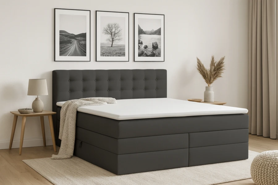 Modernes Boxspringbett in Anthrazit mit Decke im stilvollen Schlafzimmer-Ambiente.