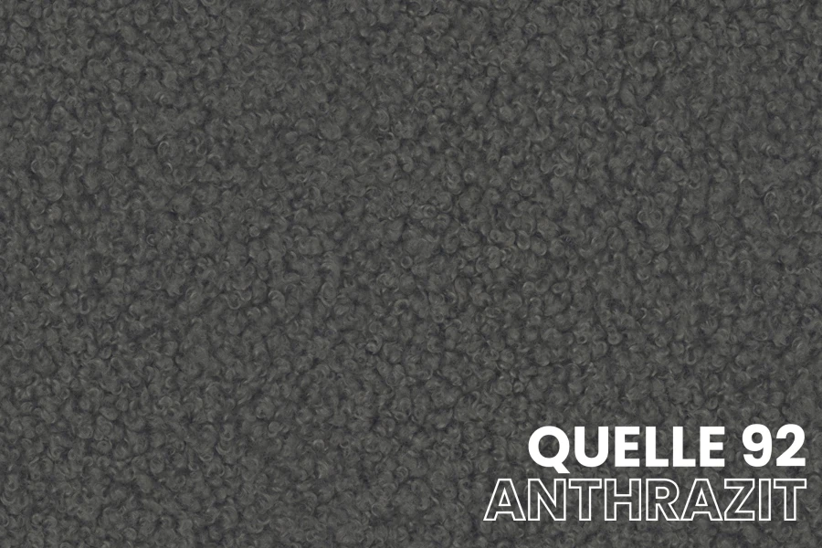 Stoffmuster Anthrazit Quelle 92: Bouclé-Gewebe für hochwertige Polsterbetten.