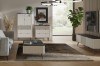 Modernes Wohnzimmer-Set bestehend aus TV-Board, Couchtisch und Kommoden in Beige.