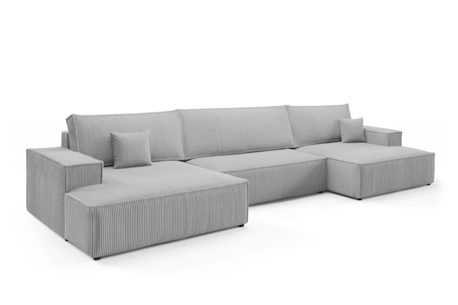 Großes U-Sofa in Hellgrau mit weichem Cord-Bezug vor weißem Hintergrund.