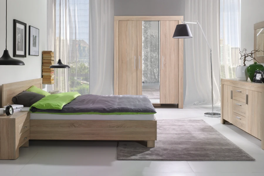 Vollständig eingerichtetes Schlafzimmer mit Bett, Schrank und Kommode der Serie Caspar.