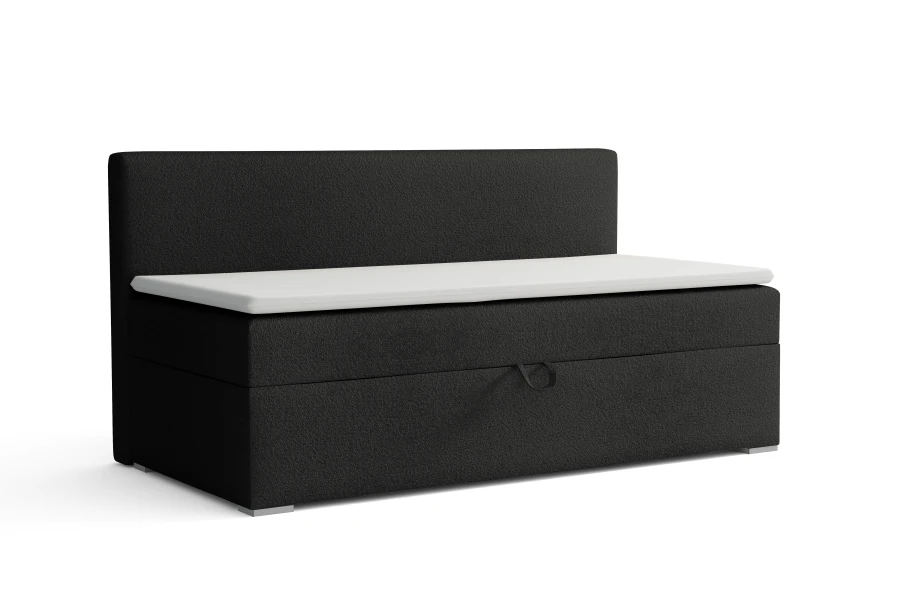 Minimalistisches Polsterbett mit Bettkasten in Schwarz, freigestellt auf Weiß.